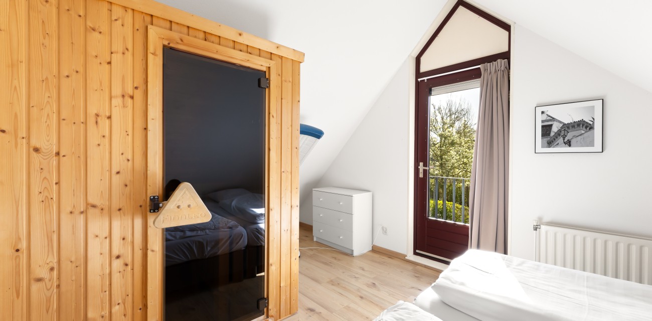 Orchis Wellness - Sauna Slaapkamer.jpg